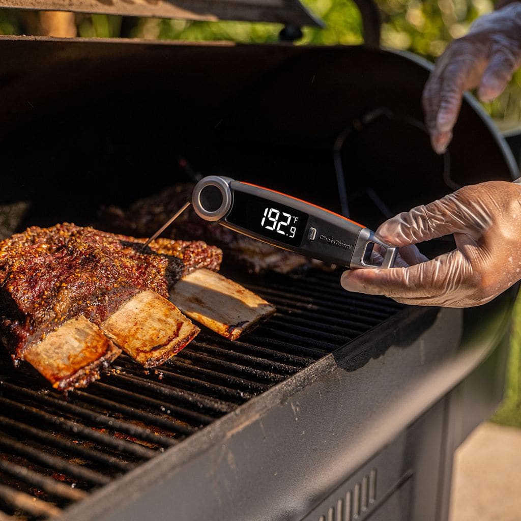 Digital meat thermometer for BBQ grilling and smoking, accurate temperature monitoring.