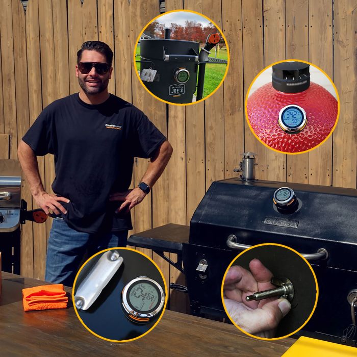 Wireless meat thermometer on a red grill lid showing temperature monitoring.
