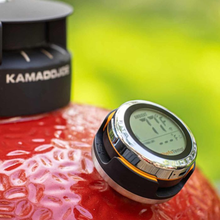 Digital wireless meat thermometer for precise grilling and smoking, ideal for outdoor barbecue enthusiasts.