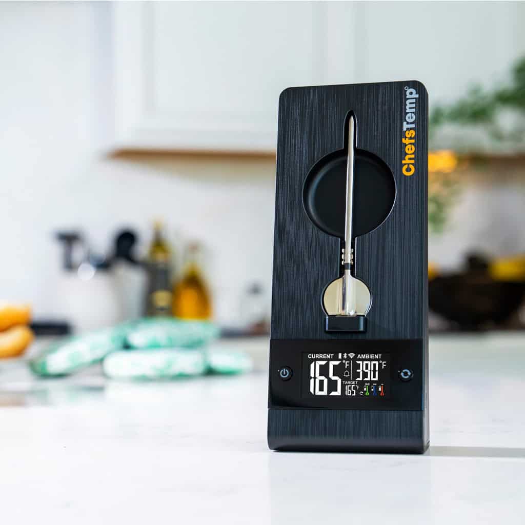 Wireless meat thermometer with digital display and probe, perfect for precise grilling at ChefsTemp.